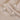 Close-up of Honey Glow SJUMO Tencel Sateen fabric: 100% natural TENCEL Lyocell, sateen weave with natural sheen, made from sustainably sourced eucalyptus fibres.