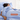 Woman asleep under a Light Blue SJUMO organic cotton duvet cover, naturally breathable.