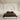 SJUMO Silky Smooth dekbedovertrekset in Dark Brown op een tweepersoonsbed in een minimalistische crèmekleurige slaapkamer