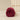 Rolled-up SJUMO Silky Smooth fitted sheet in Burgundy