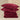 Two SJUMO Silky Smooth pillowcases stacked on a folded duvet cover in Burgundy