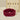 SJUMO Silky Smooth sleep mask in burgundy, rolled up to show the soft inner lining