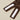 Adjustable velcro closure of the SJUMO sleep mask in Cacao Brown, close-up