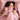 Woman wrapped in a Soft Pink SJUMO Tencel Sateen duvet cover, silky soft and gentle on your skin.